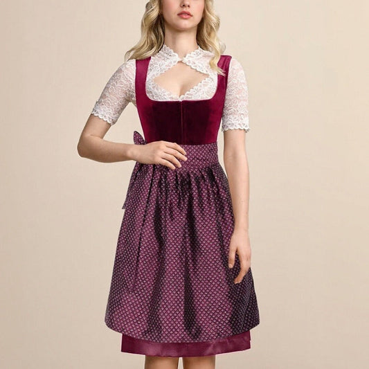 Zwarte traditionele jurk met bloemenborduurwerk – vintage dirndl met schort voor het Oktoberfest