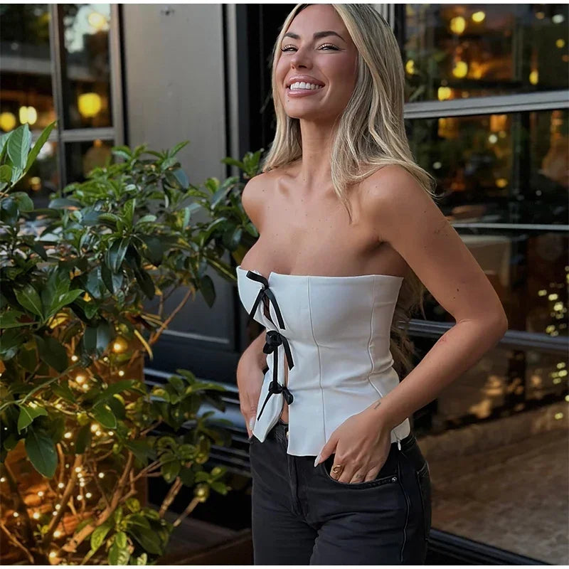 Mirela - Strapless top met strikjes